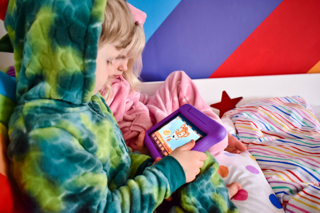 Twins watching ipad