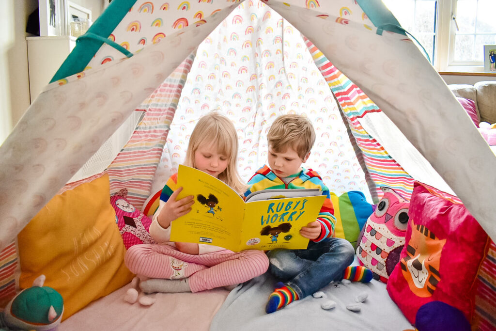 twins in rainbow den during a lazy half term