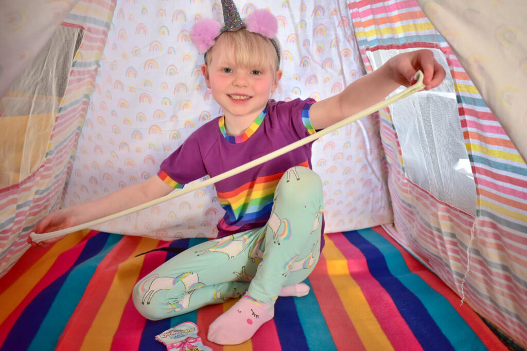 Girl stretching ZURU Puppycorns Magic Poop