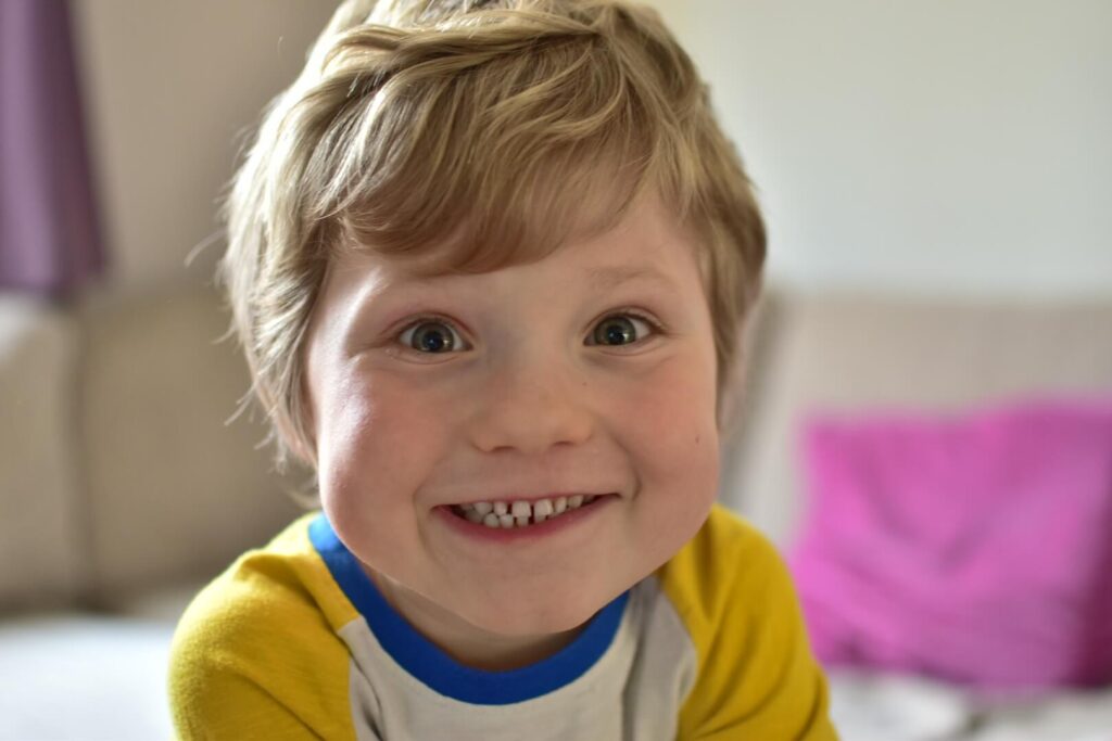 Boy pulling silly face