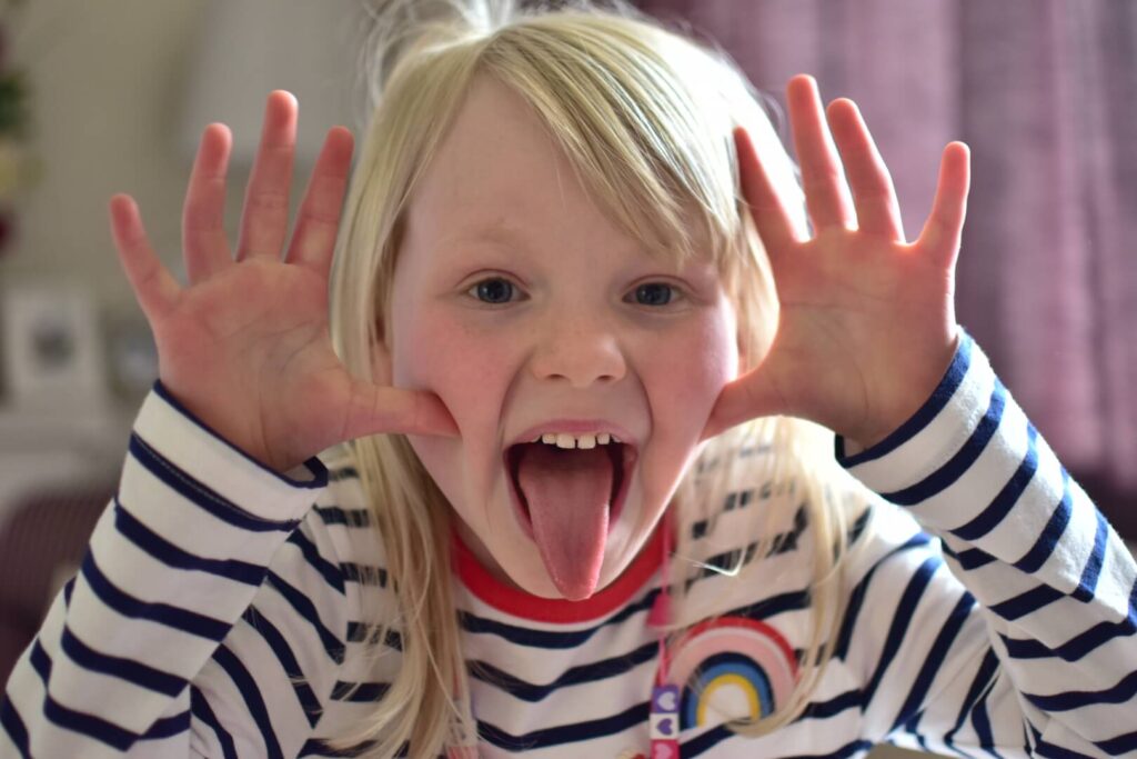 Girl pulling silly face - feeling overwhelmed