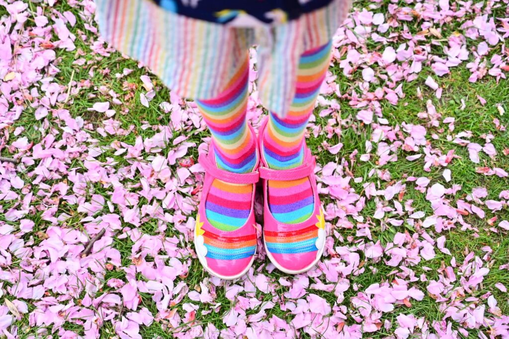 Girl's feet in blossom