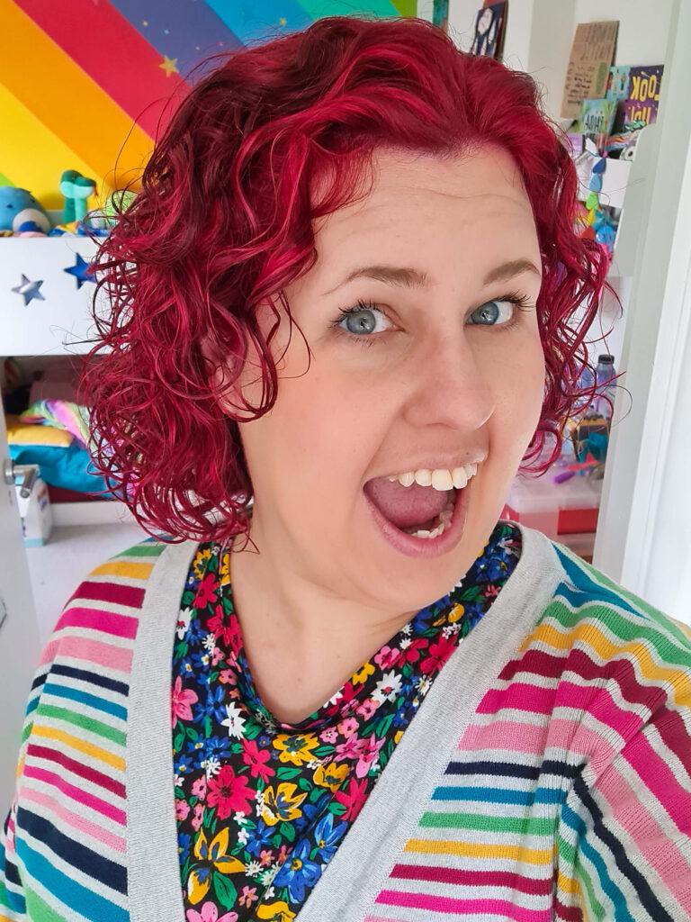 White woman with red curly hair