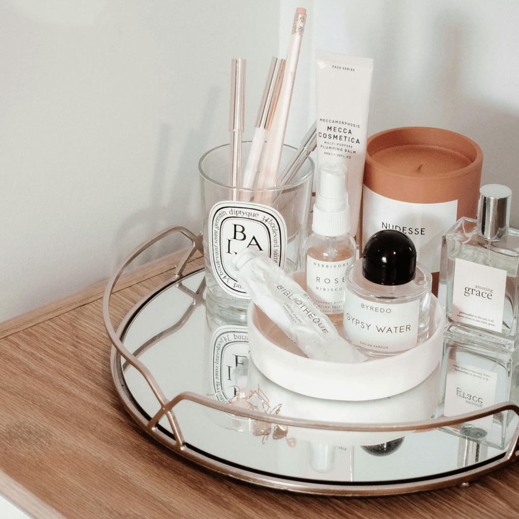 display of perfumes and toiletries on a tray