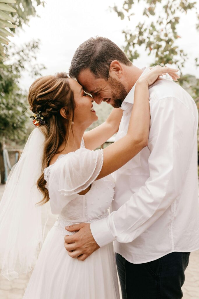 photo of couple embracing on wedding day