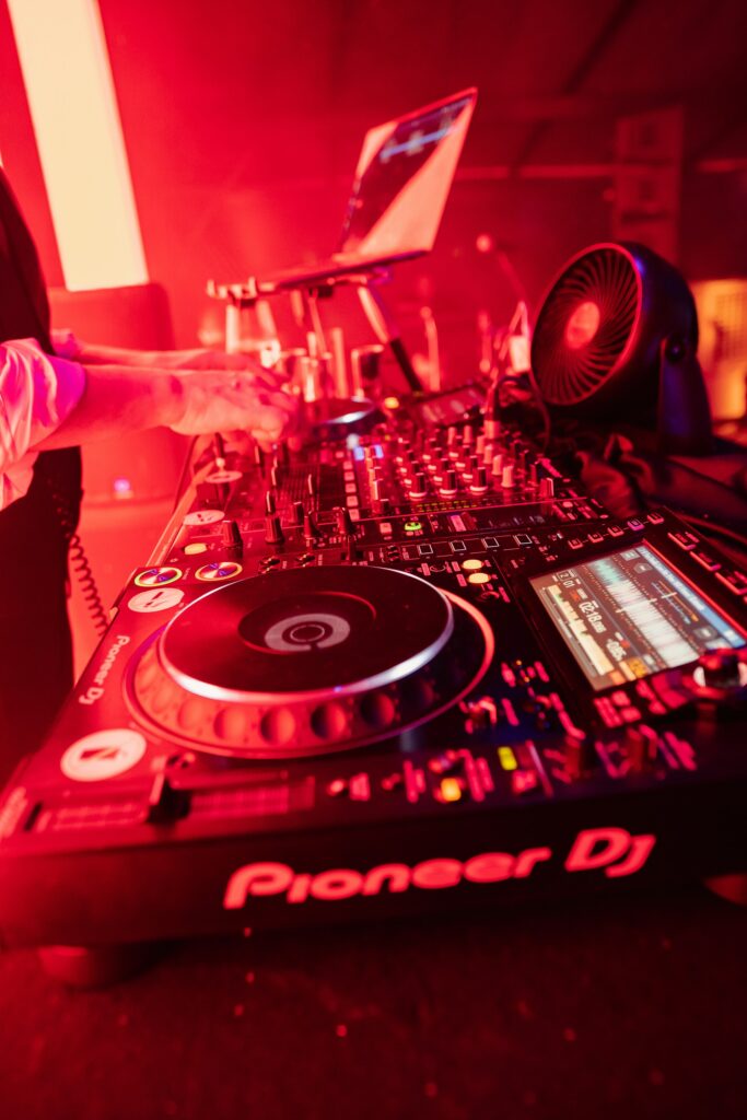 DJ decks with the hand of a professional DJ